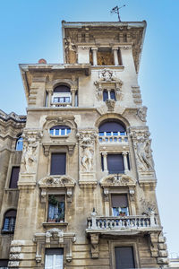 Low angle view of old building against sky