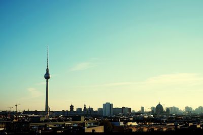 View of communications tower in city