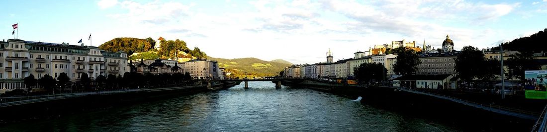 View of bridge over river in city