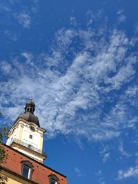 Low angle view of building against blue sky