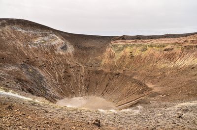 Scenic view of vulcan crater against sky