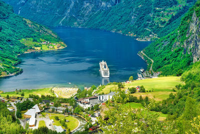 High angle view of trees by sea