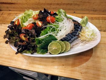 High angle view of salad in plate on table