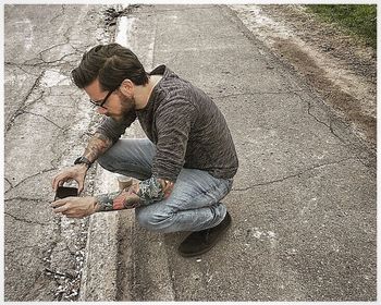 Side view of young man looking away