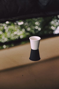 Close-up of coffee cup on table