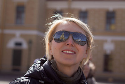 Portrait of woman wearing sunglasses