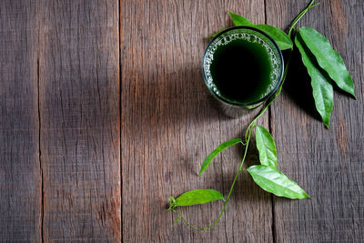 Directly above shot of green leaves on table