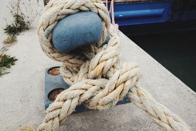 Close-up of rope tied on metal