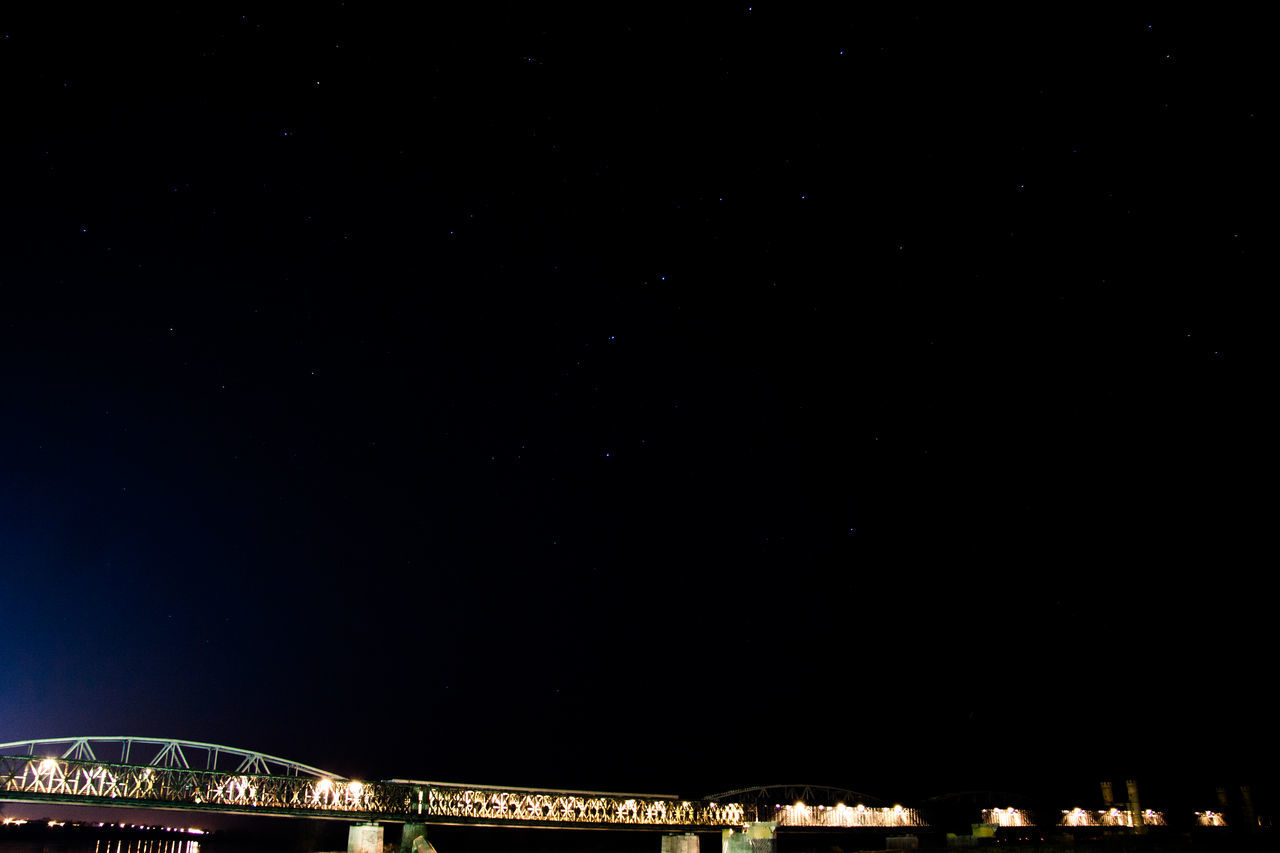 night, astronomy, low angle view, sky, star - space, scenics, constellation, no people, outdoors, illuminated, architecture, space, star field, galaxy, nature