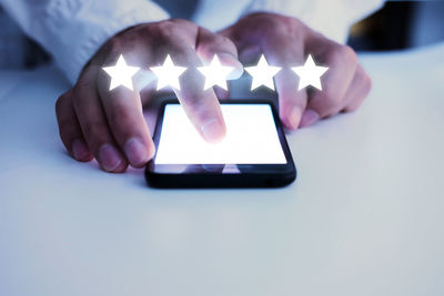 Close-up of hand holding smart phone