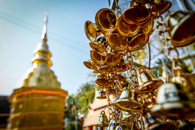 Close-up of bell tower against building