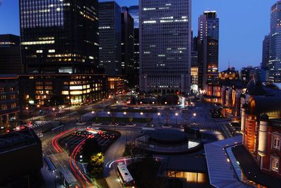 High angle view of illuminated city street at night