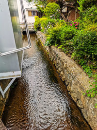 High angle view of canal by building