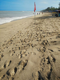 View of footprints on sand