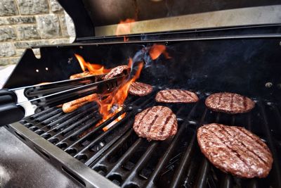 Close-up of meat on barbecue grill