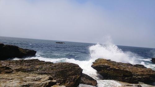 Scenic view of sea against clear sky