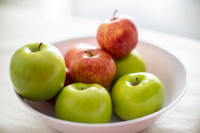 Close-up of fruits in bowl on table