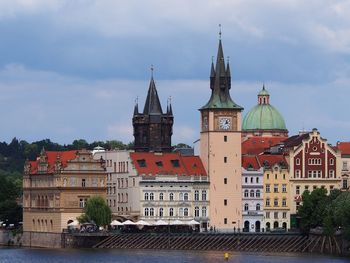 Buildings in city against sky