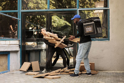 Rear view of man standing on street