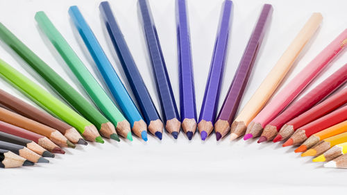 High angle view of colored pencils on table