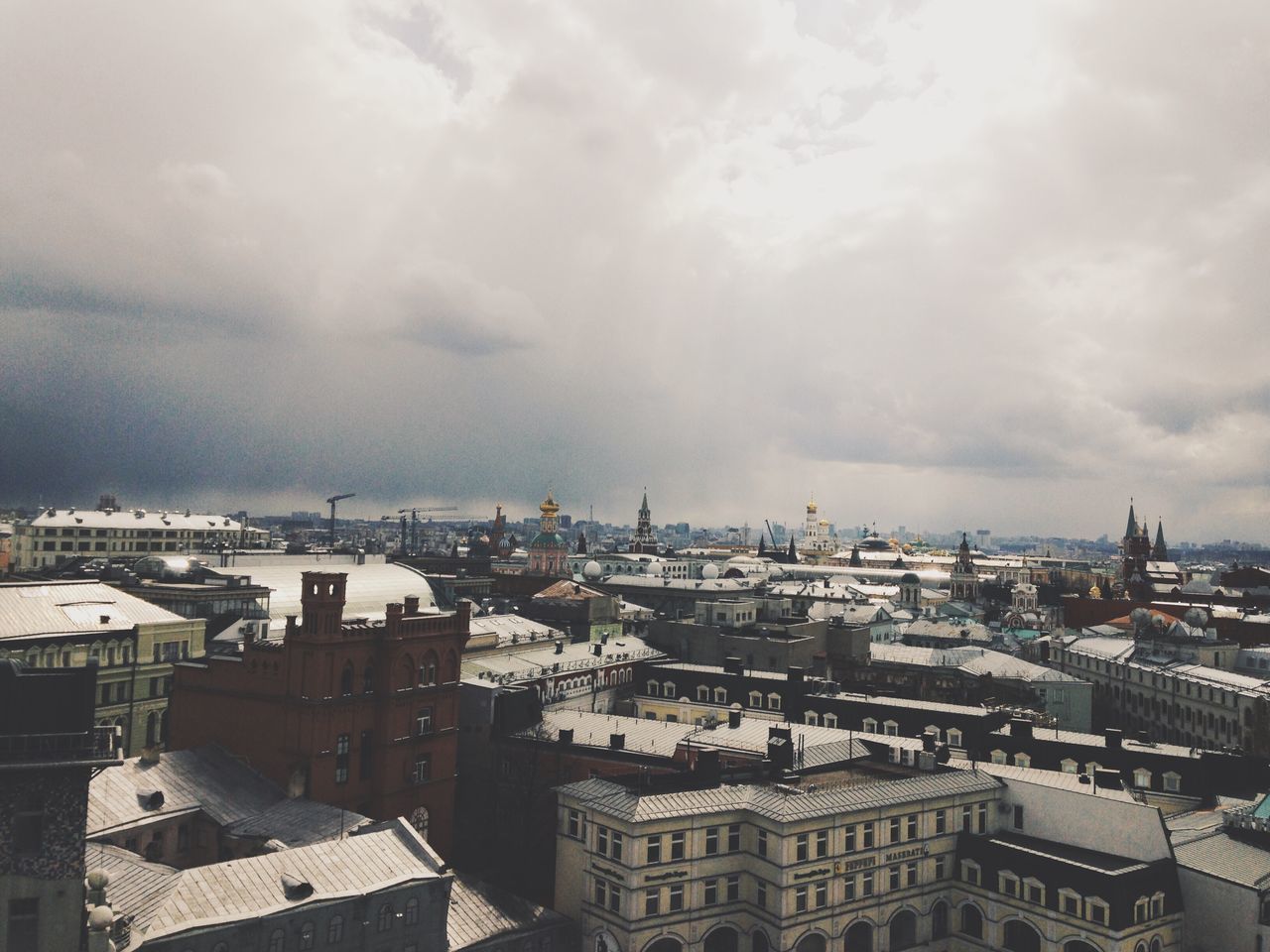 building exterior, architecture, built structure, city, cityscape, sky, cloud - sky, crowded, high angle view, residential district, residential building, residential structure, cloudy, city life, cloud, outdoors, day, no people, building, skyscraper