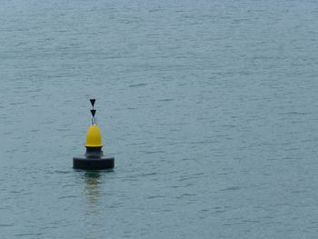 Yellow floating on water in lake