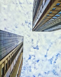 Low angle view of skyscraper against sky