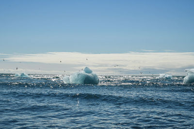 Scenic view of frozen sea against sky