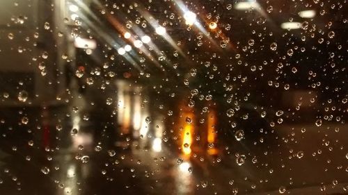 Full frame shot of raindrops on window