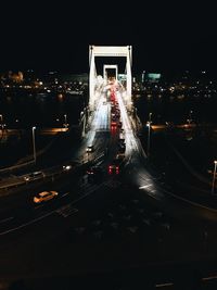 High angle view of illuminated bridge at night