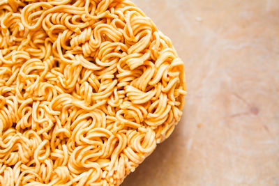 Close-up of raw noodles on table