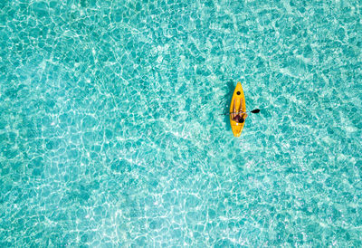 High angle view of swimming in pool