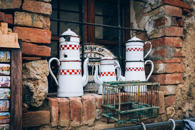 Teapots on old window sill