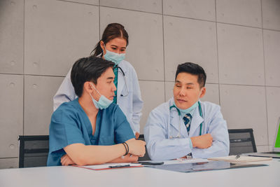 Doctors having discussion at hospital