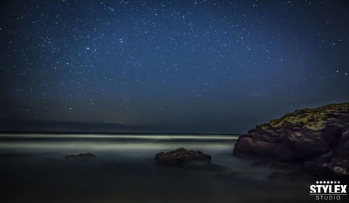 Low angle view of stars in sky at night