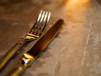 Close-up of spoon on table