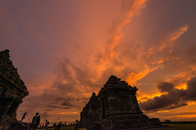 Low angle view of temple against sky during sunset