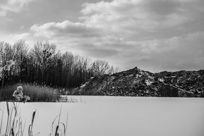 Scenic view of mountains against sky during winter