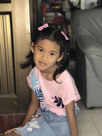 Portrait of smiling girl at home