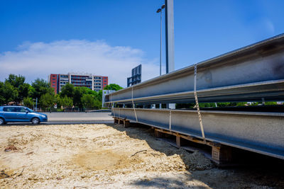 Train against sky in city