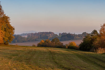 Scenic view of field against sky during autumn