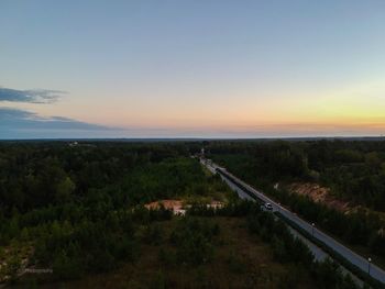 Scenic view of landscape against sky during sunset