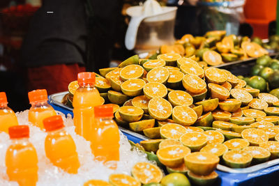 Close-up of oranges for sale at market stall