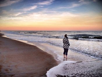 Scenic view of sea at sunset