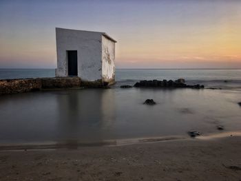 Scenic view of sea against sky during sunset