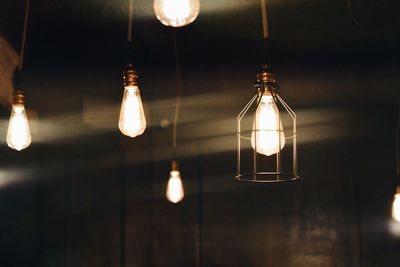 Light bulbs hanging on ceiling