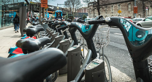 Bicycles parked on street in city