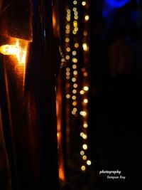 Close-up of illuminated lights at night