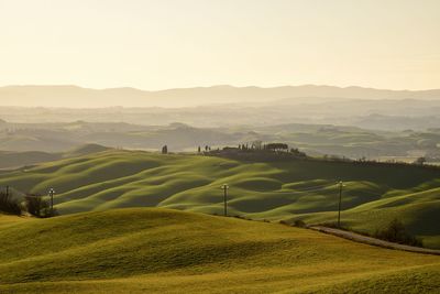 Scenic view of landscape against sky during sunset