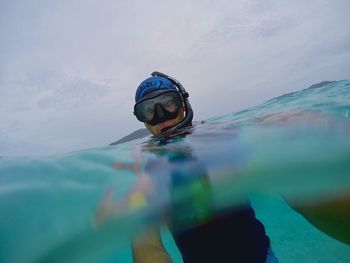 Man snorkeling in sea